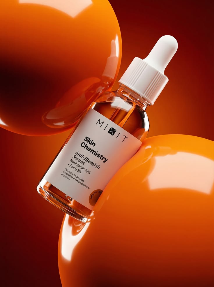 Foto de produto de sérum sobre esferas laranja